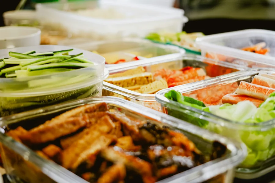Clear plastic containers of prepared food