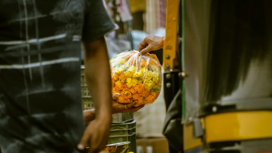 A paper bag of food handed over