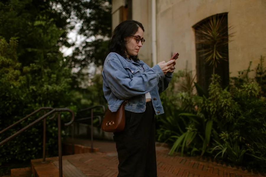 Someone making a phone call outdoors