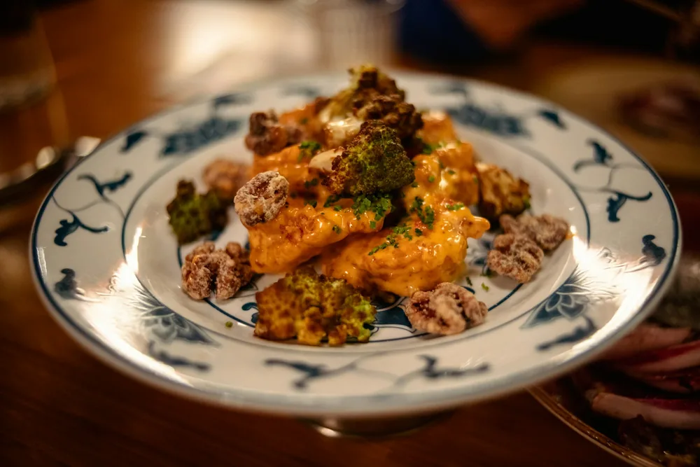 Chicken stir fried with broccoli on a plate