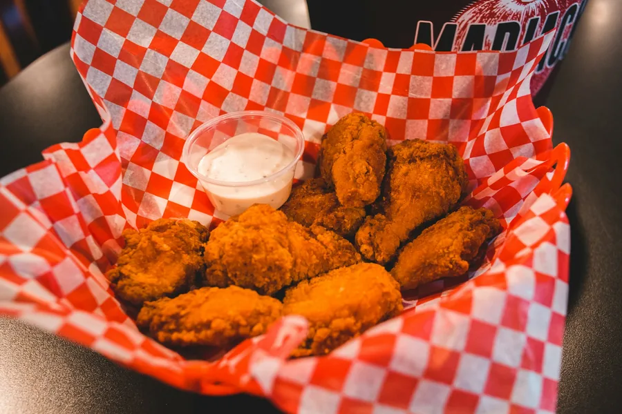 A platter of fried chicken wings for sharing