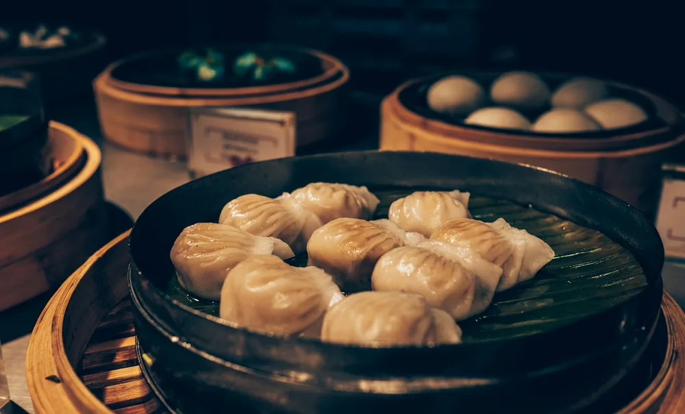 Chinese dumplings in a bamboo steamer