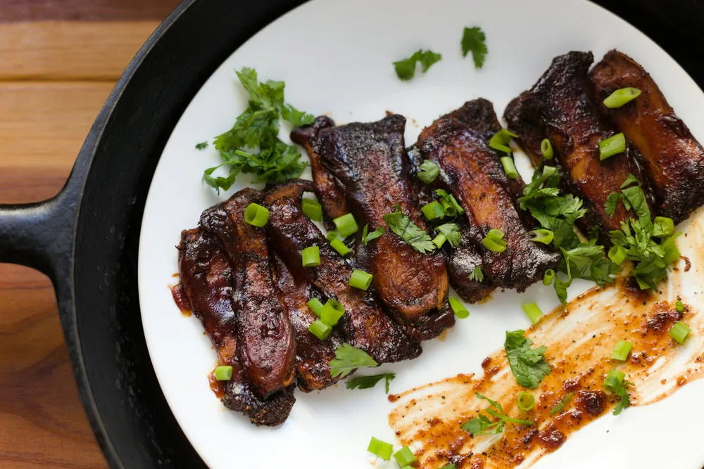Glazed Chinese-style spare ribs on a plate