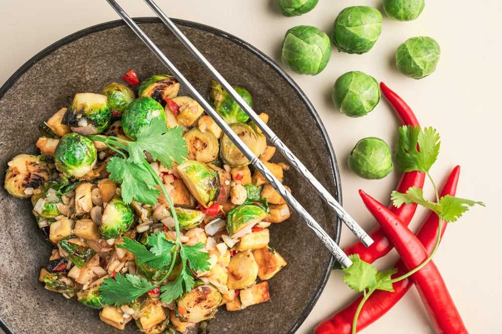 Mixed Chinese vegetables stir fried in a pan