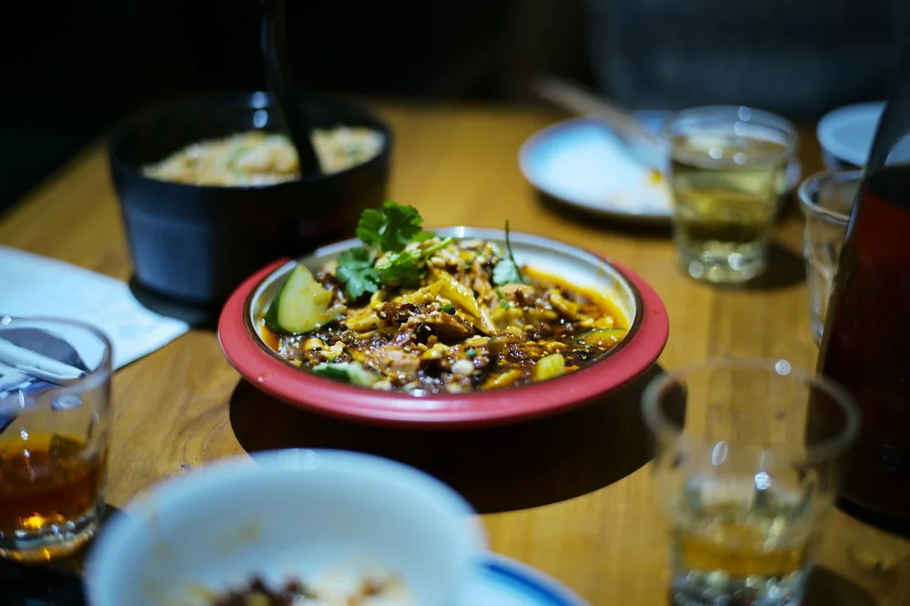 Rice bowls set out on a table for a shared meal