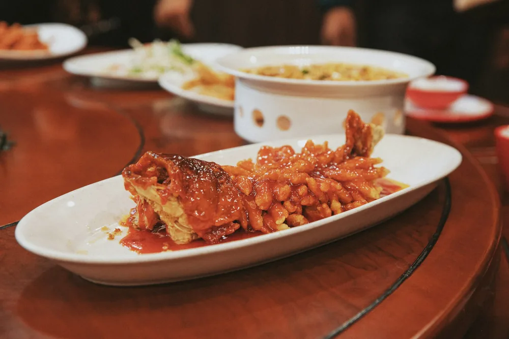 A shrimp dish plated at a restaurant