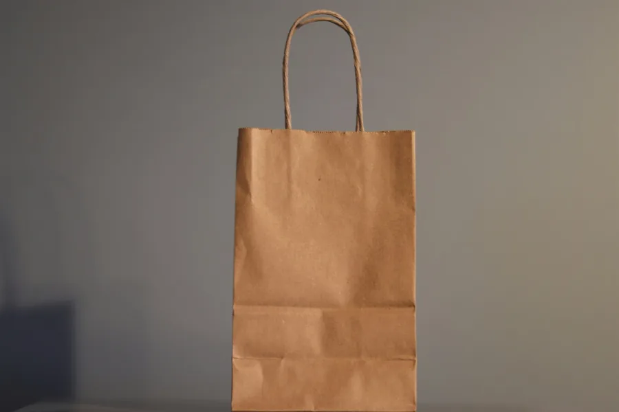 A paper takeout bag packed for collection