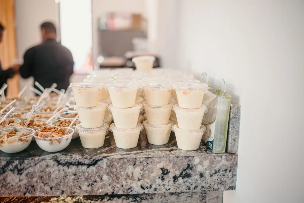 Two open takeout containers side by side