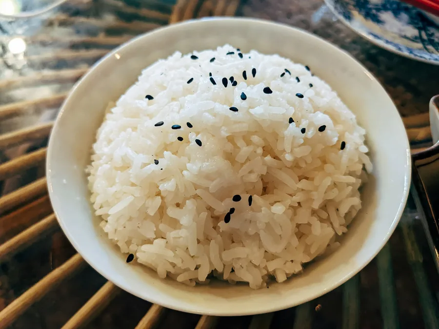 A plate of white rice served as a side