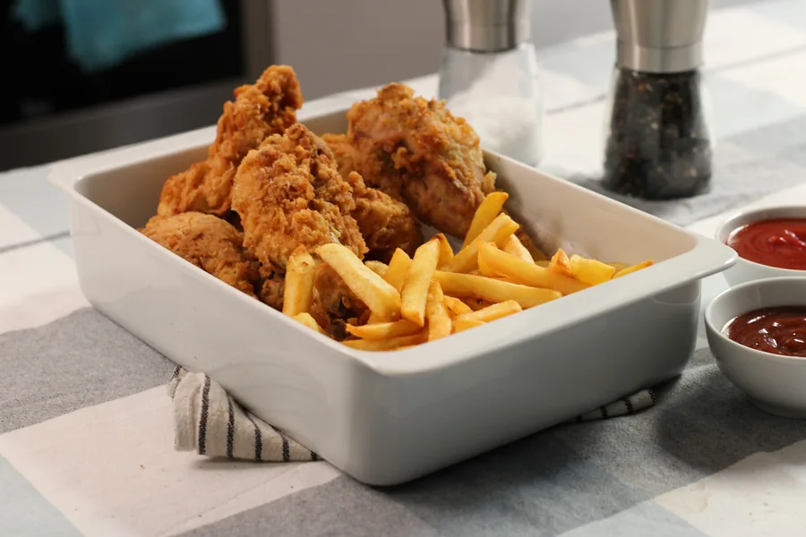Chicken nuggets served with fries