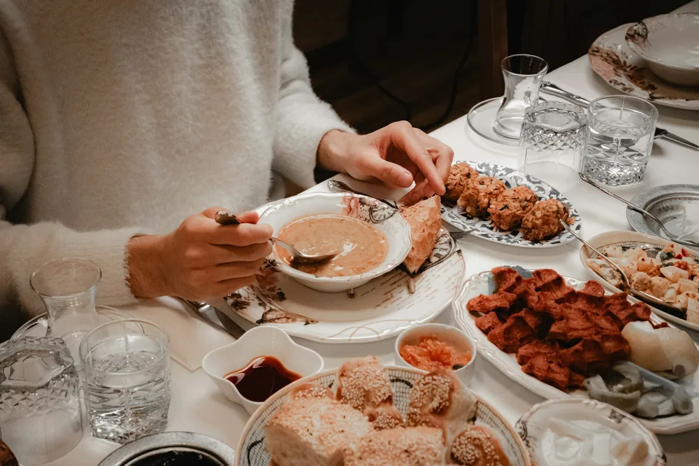 A takeout dinner laid out on a table at home