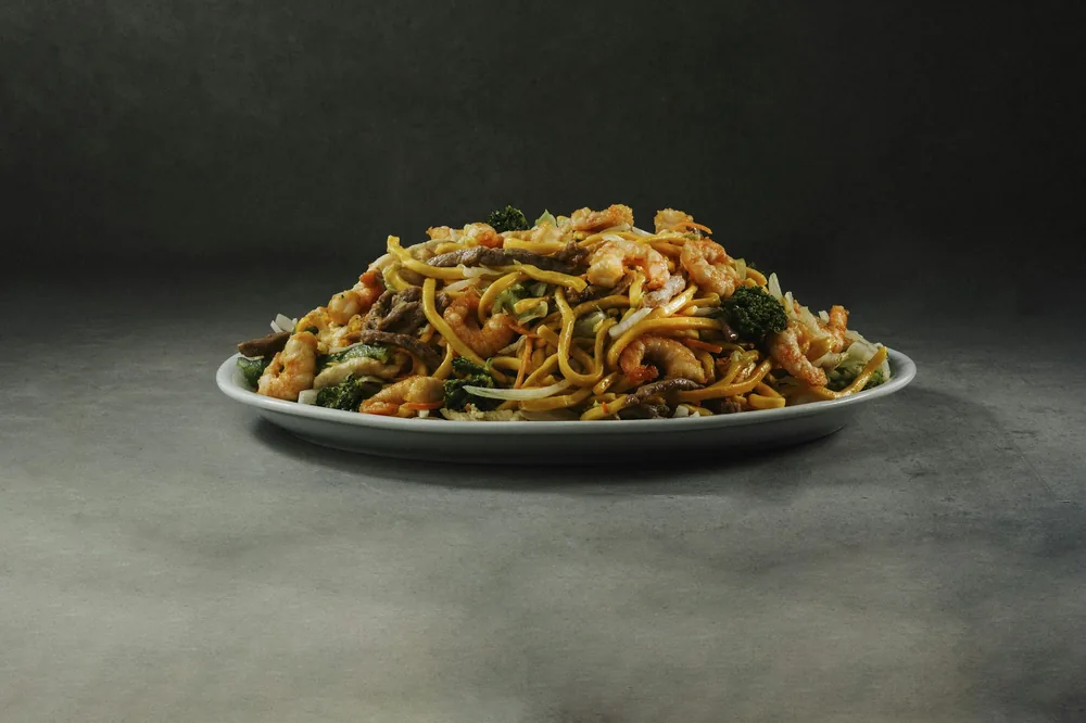 Noodles tossed with a mix of proteins
