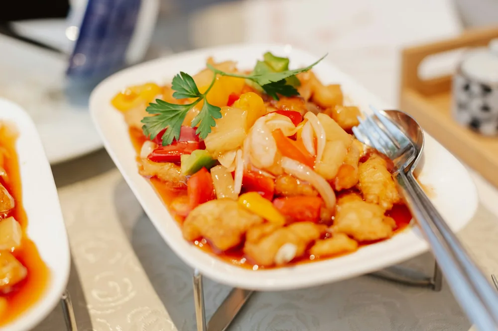 Sweet and sour chicken with pineapple and peppers