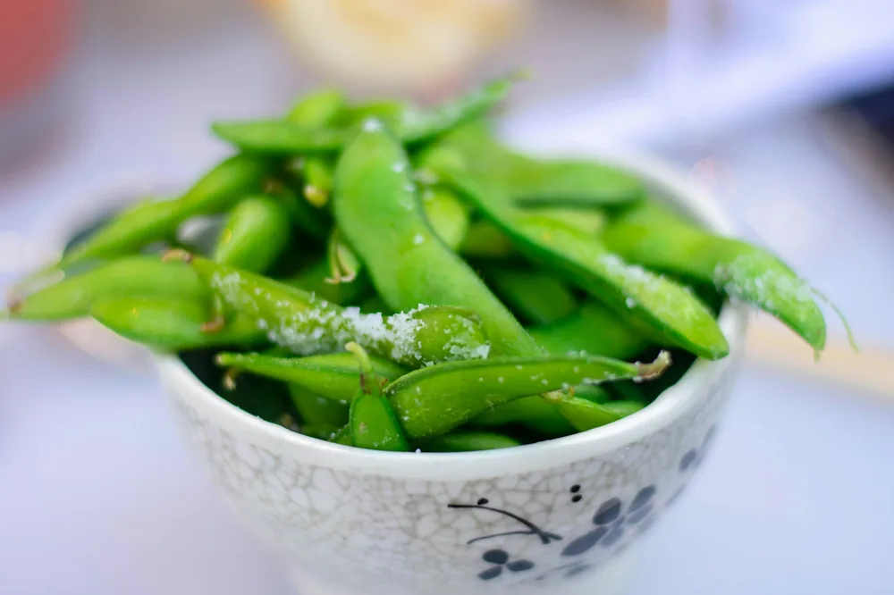 Pork stir fried with snow peas and vegetables