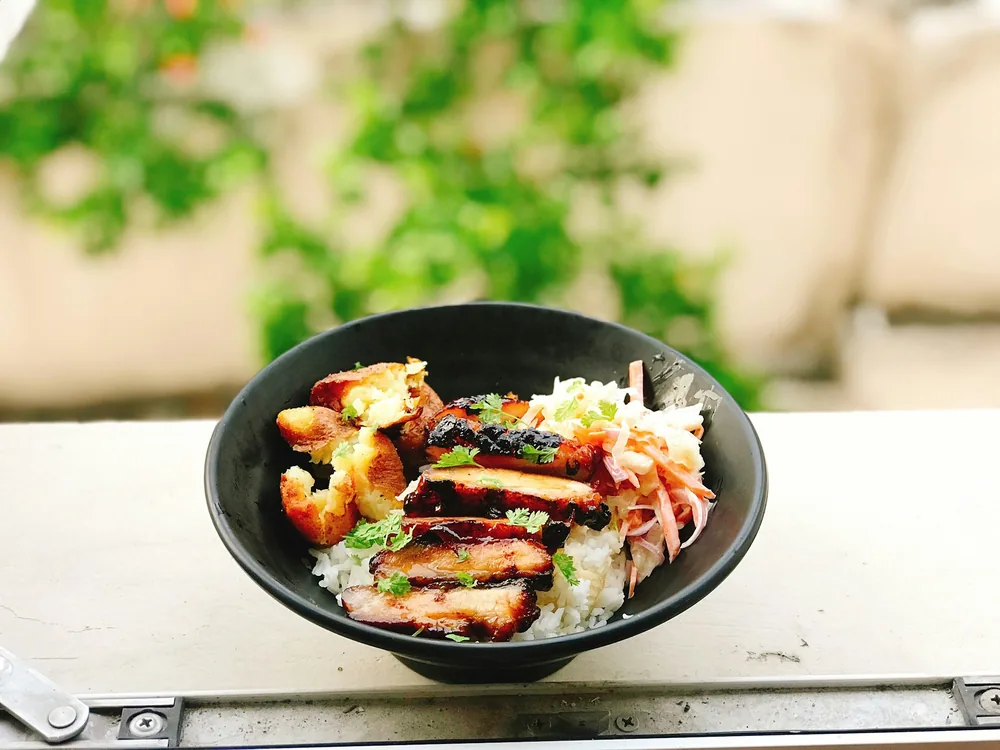 Roast pork served over rice