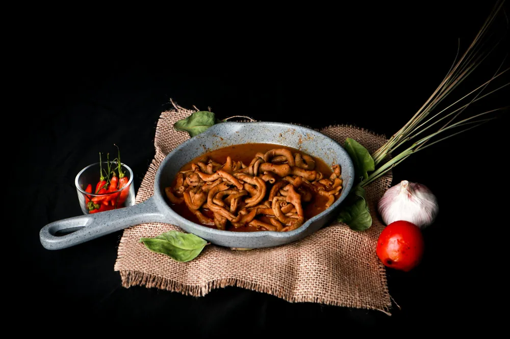 Shredded pork stir fried in a wok