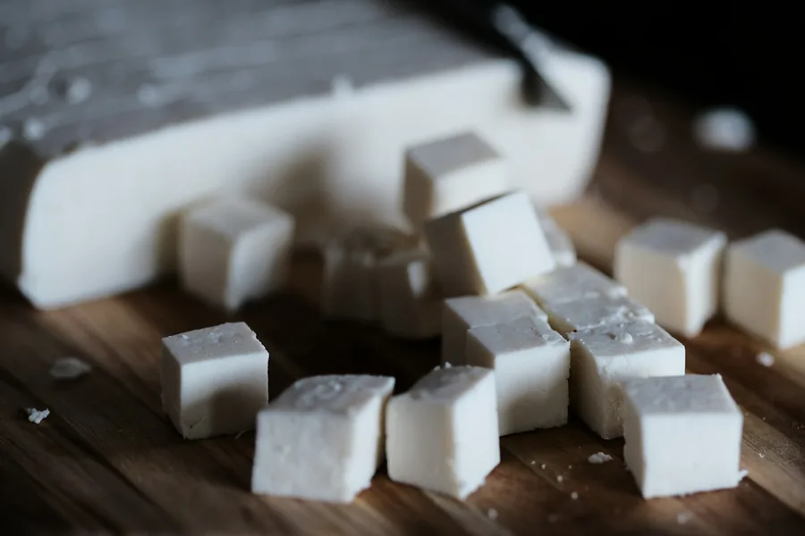 A fresh block of tofu cut into cubes