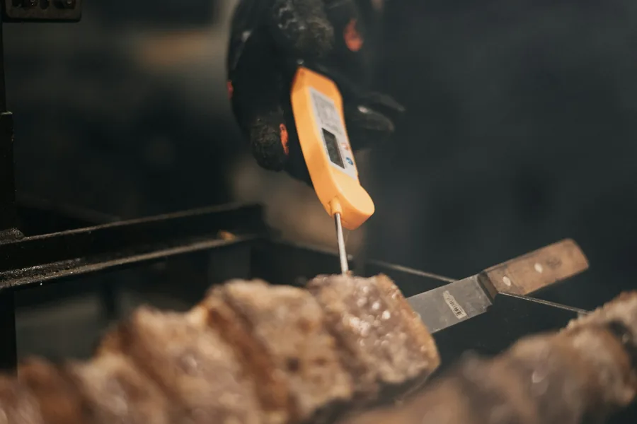 A probe thermometer used to check food temperature