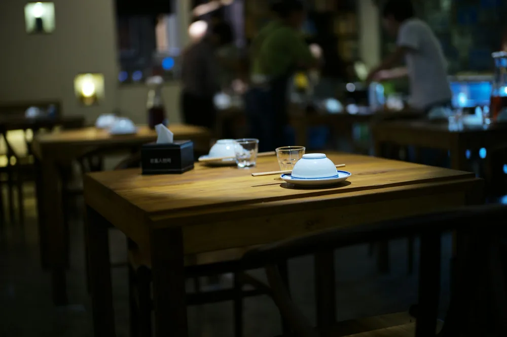An evening table set for dinner at a restaurant