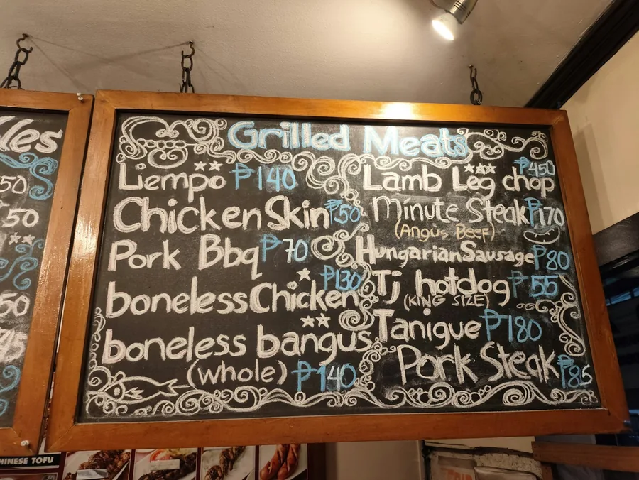 A restaurant board listing the day&rsquo;s specials
