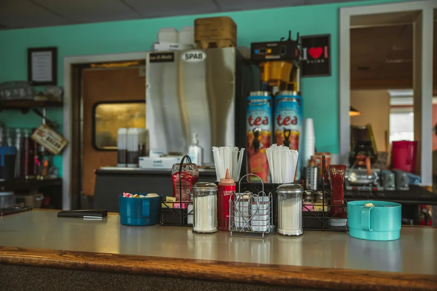 Takeout containers stacked on a counter