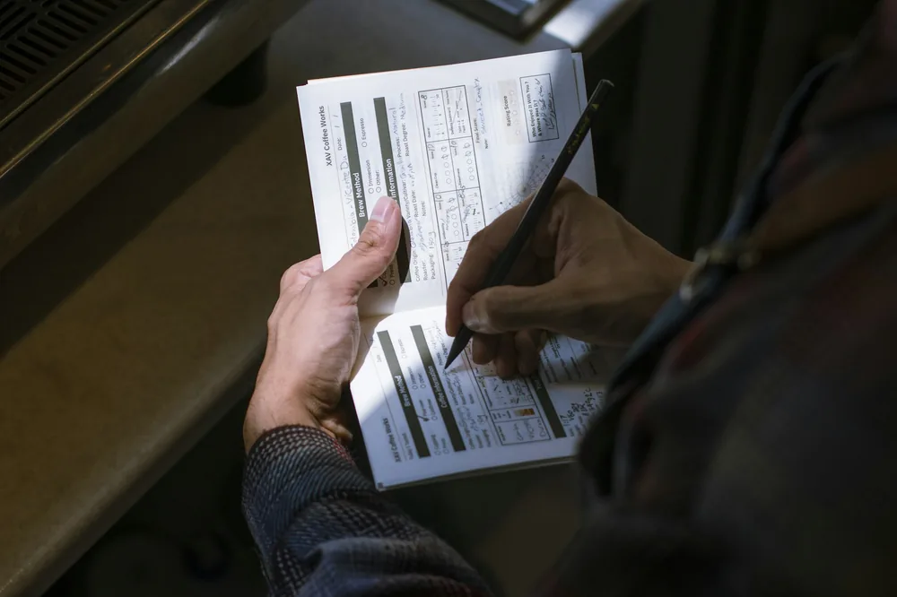 An order being written down on a notepad