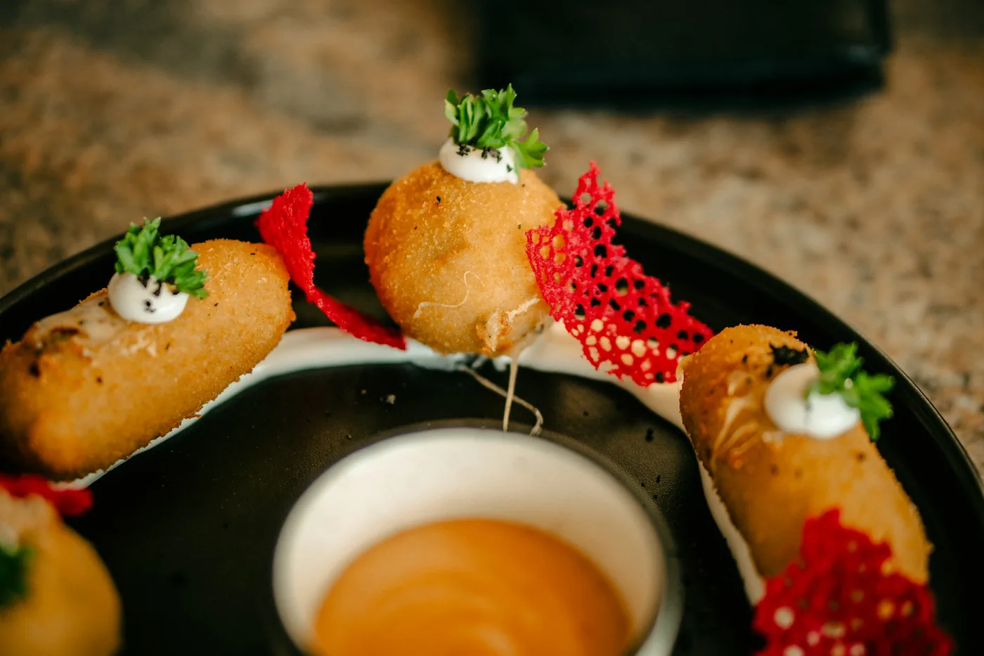 Golden fried rolls served as an appetizer