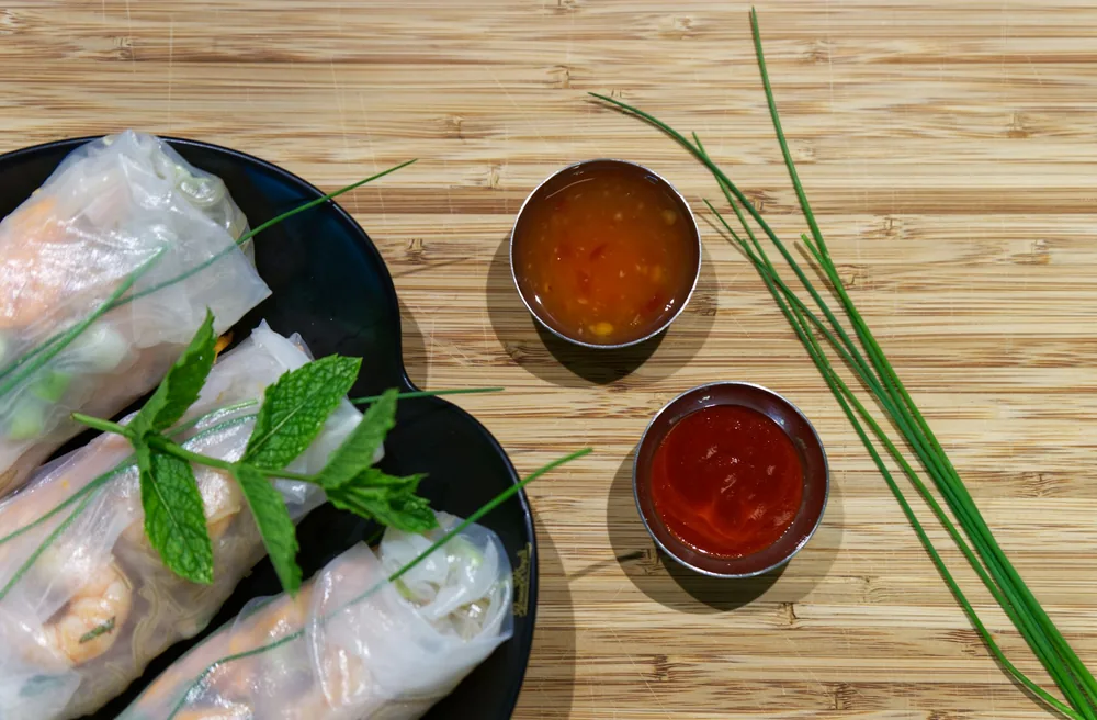 Fresh spring rolls in rice paper with dipping sauces