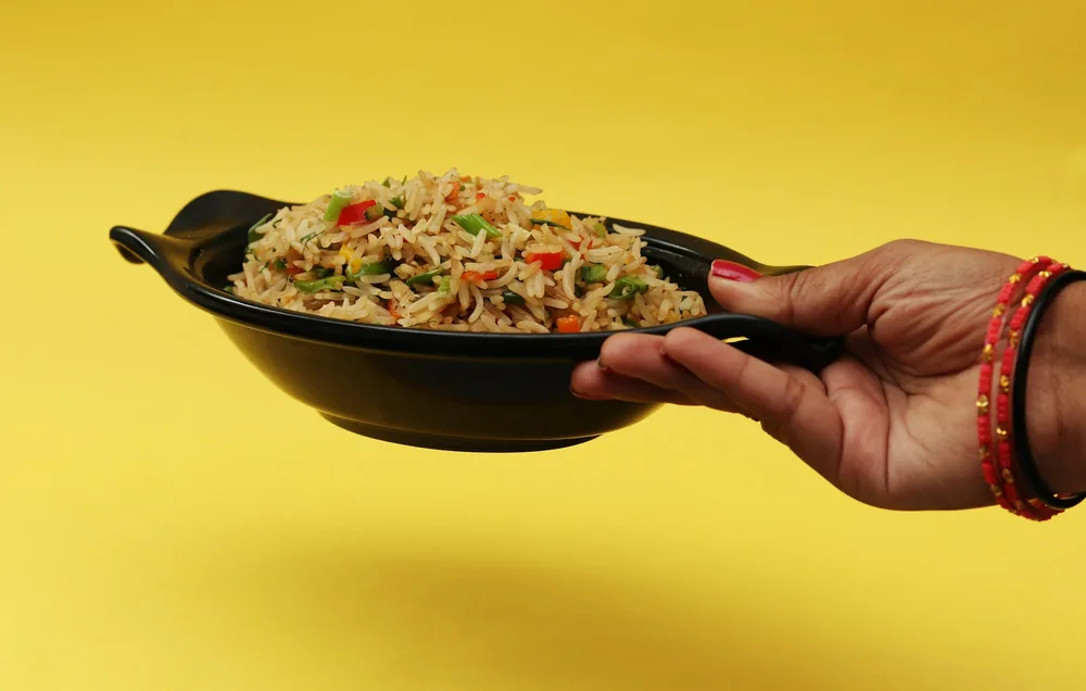 Vegetable fried rice with peas and carrots