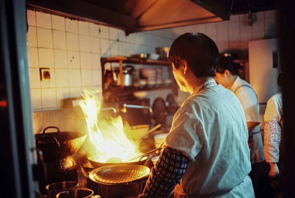 A restaurant wok station with burners