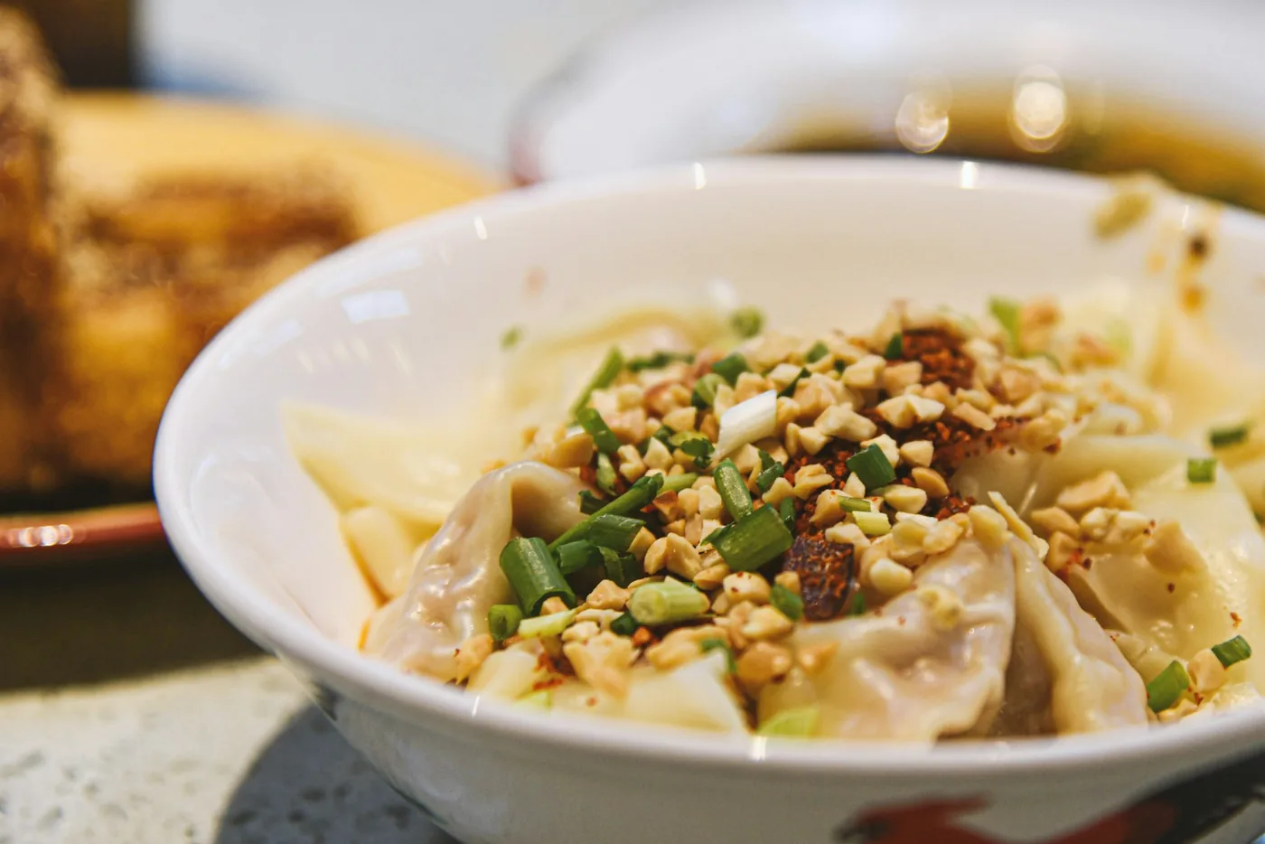 Dumplings and wontons served side by side