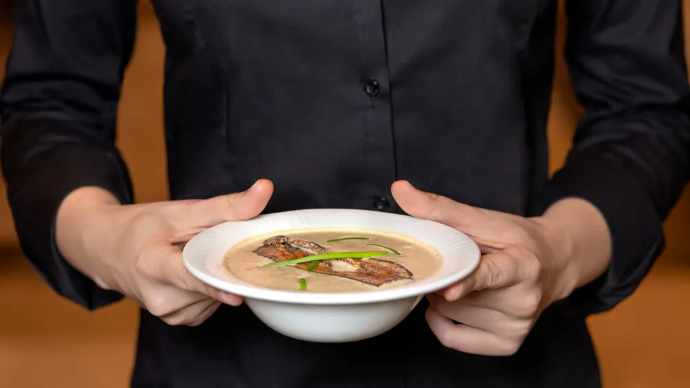 Wontons served in a clear broth