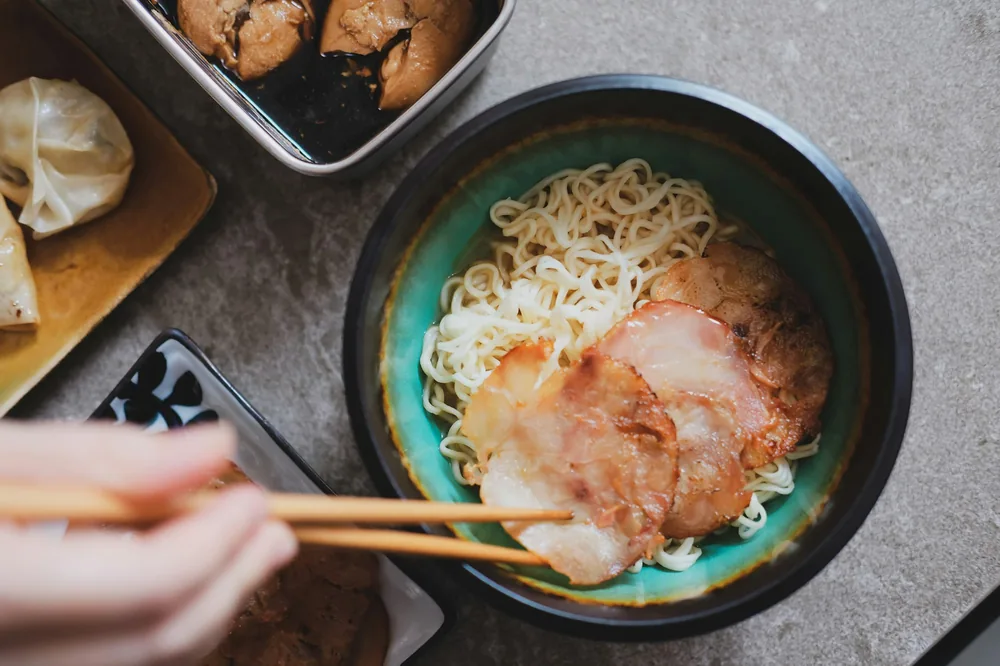 Noodles in an open takeout container