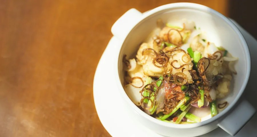 Seafood served in a pale, light sauce
