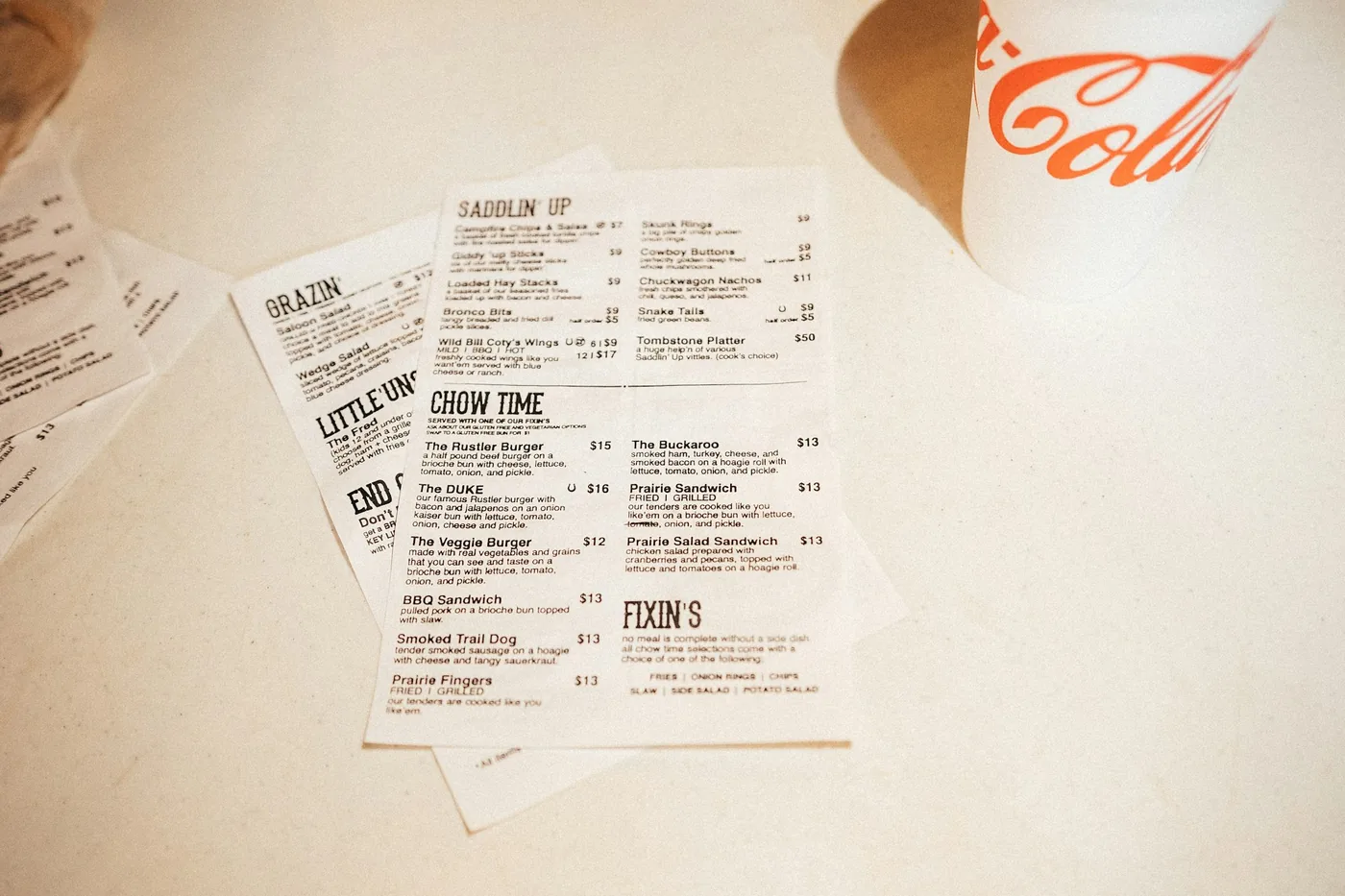 Chinese takeout menus laid out on a table